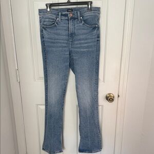 Express skyscraper, mid rise, slight stretch, slight flare with slit at hem